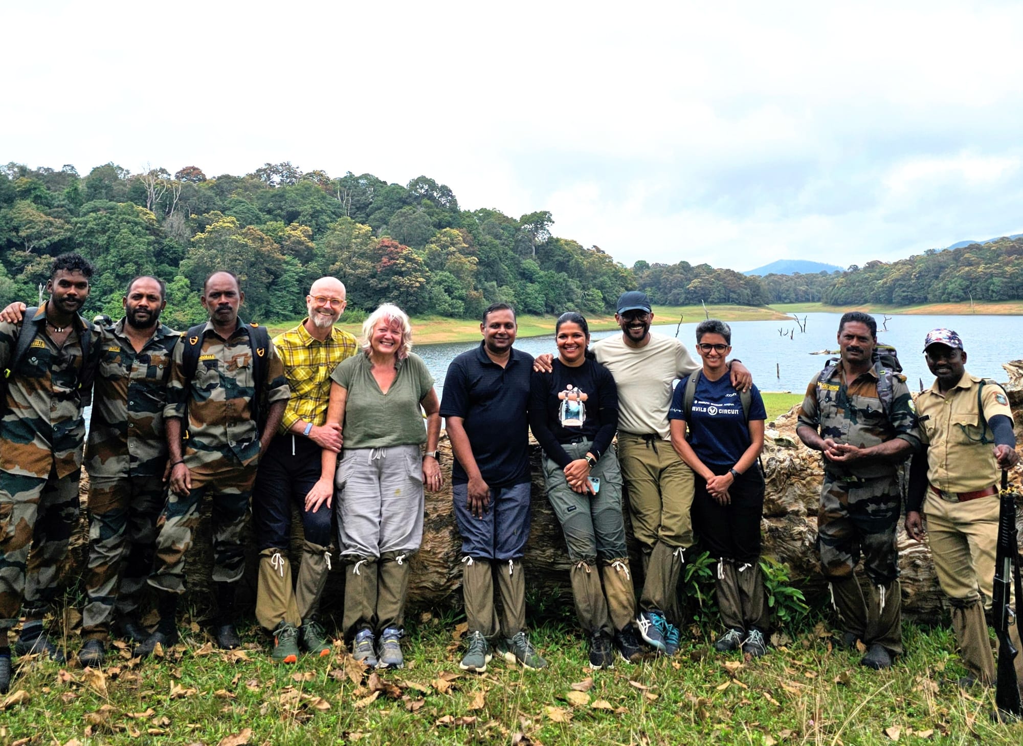 The trekking group with the forest guards by Periyar lake